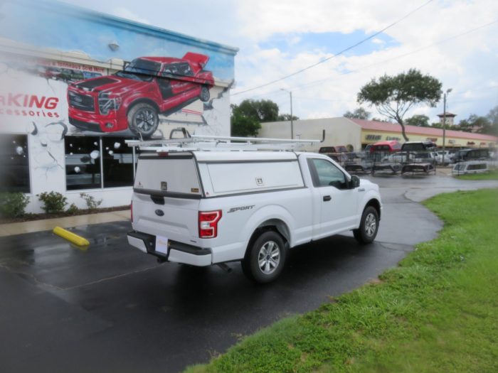 2019 Ford F150 with LEER DCC Commercial Topper, Roof Racks, Decked, and Hitch by TopperKING Brandon 813-689-2449 or Clearwater, FL 727-530-9066. Call Today!