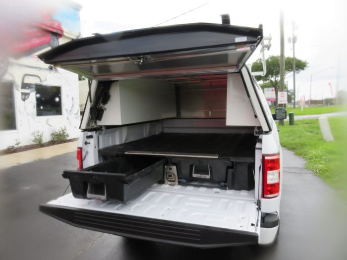 2019 Ford F150 with LEER DCC Commercial Topper, Roof Racks, Decked, and Hitch by TopperKING Brandon 813-689-2449 or Clearwater, FL 727-530-9066. Call Today!