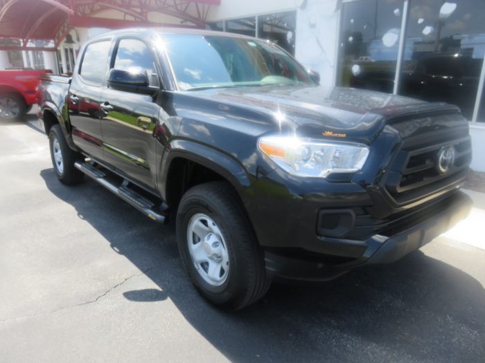 2020 Toyota Tacoma with Ranch Legacy Fiberglass Lid, Nerf Bars, Bug Guard, Tint, Hitch. Call TopperKING Brandon 813-689-2449 or Clearwater FL 727-530-9066.