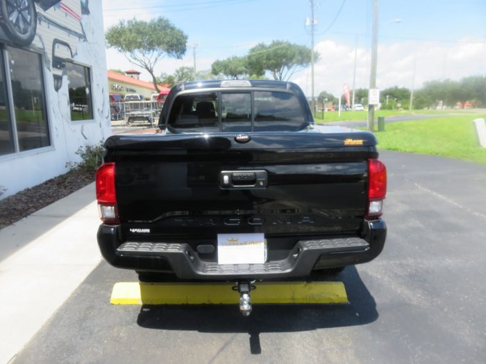 2020 Toyota Tacoma with Ranch Legacy Fiberglass Lid, Nerf Bars, Bug Guard, Tint, Hitch. Call TopperKING Brandon 813-689-2449 or Clearwater FL 727-530-9066.