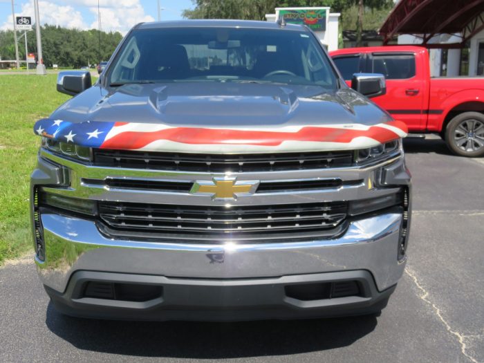 2020 Chevy Silverado with American Flag Hood Guard, Bedliner, Tint, Hitch. Call TopperKING Brandon 813-689-2449 or Clearwater FL 727-530-9066!