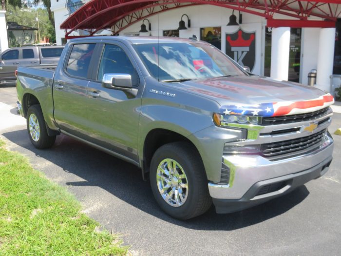 2020 Chevy Silverado with American Flag Hood Guard, Bedliner, Tint, Hitch. Call TopperKING Brandon 813-689-2449 or Clearwater FL 727-530-9066!