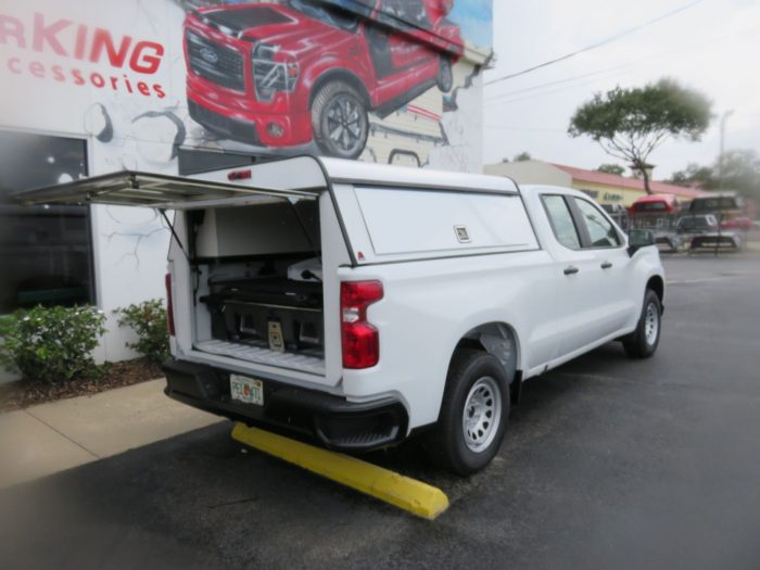 2020 Chevy Silverado with LEER DCC, Side Access, Full Back Door, Tool Boxes, Decked, Hitch. Call TopperKING Brandon 813-689-2449 or Clearwater 727-530-9066.