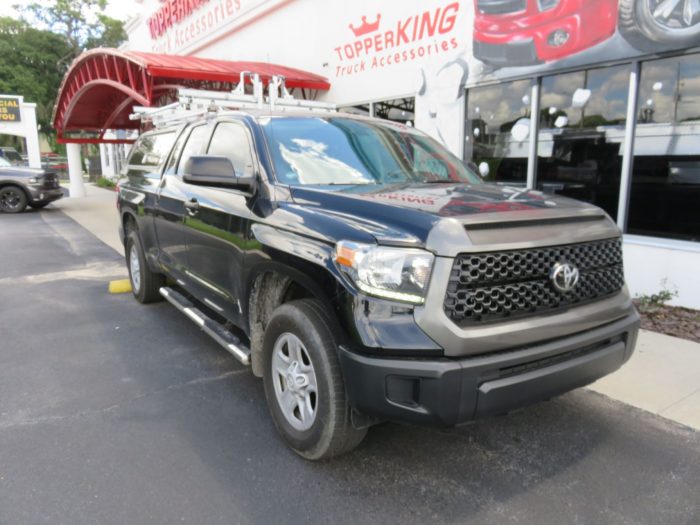 2018 Toyota Tundra with LEER 100RCC, Roof Racks, Side Access, Nerf Bars, Hitch by TopperKING Brandon 813-689-2449 or Clearwater 727-530-9066.