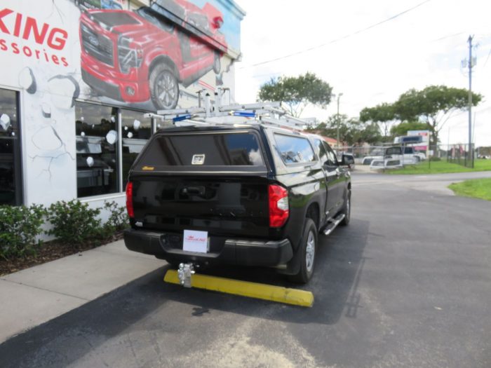 2018 Toyota Tundra with LEER 100RCC, Roof Racks, Side Access, Nerf Bars, Hitch by TopperKING Brandon 813-689-2449 or Clearwater 727-530-9066.