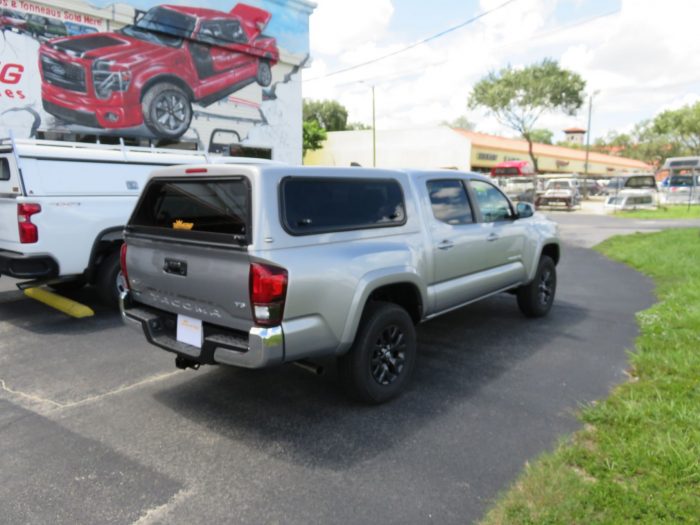 2020 Toyota Tacoma with Ranch Sierra Fiberglass Topper, Windoor, Tint, Hitch. Call TopperKING Brandon 813-689-2449 or Clearwater 727-530-9066