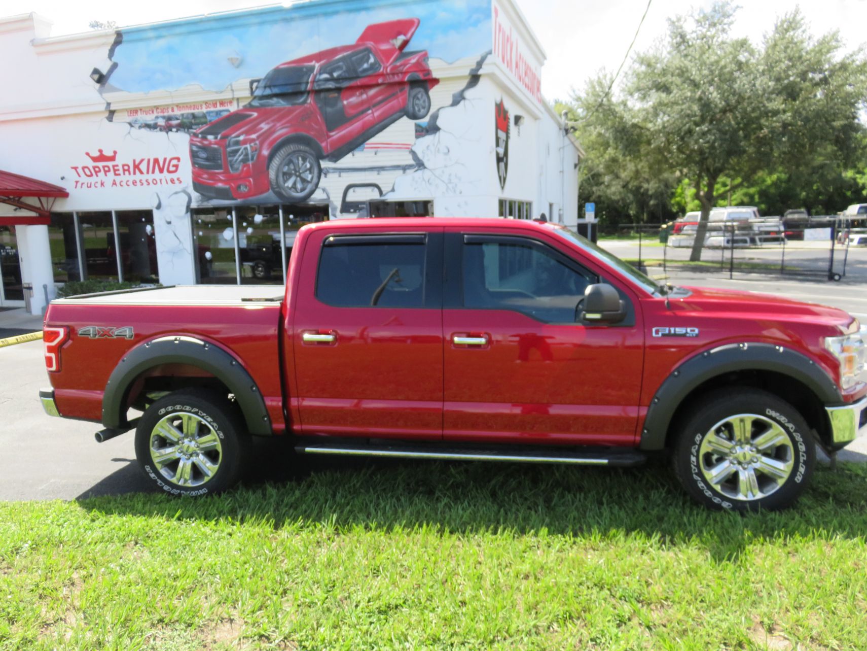 2020 Ford F150 with Roll-n-Lock, Fender Flares, Vent Visor, Side Steps, Hitch by TopperKING Brandon 813-689-2449 or Clearwater FL 727-530-9066