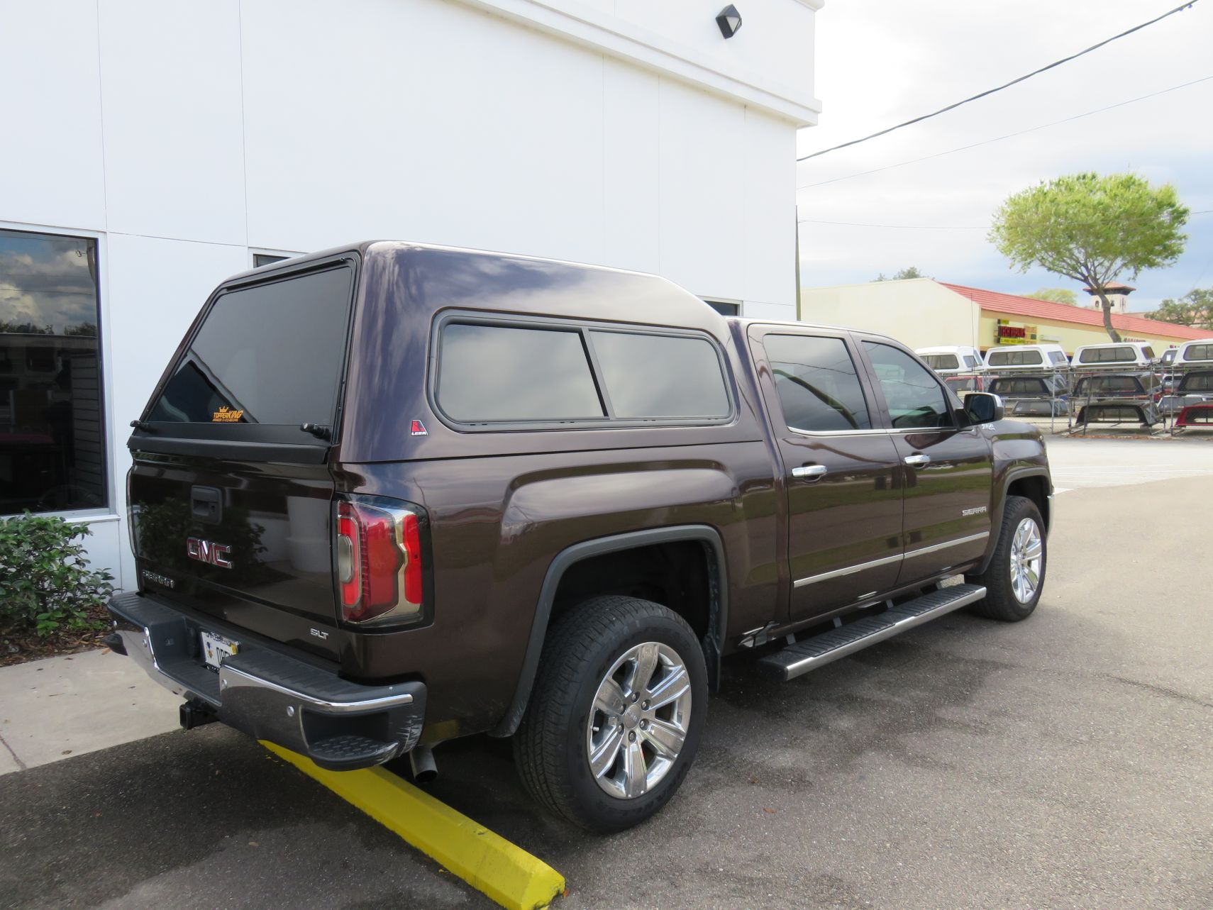 2018 Chevy Silverado with LEER 180, Side Steps, Chrome, Tint, Hitch by TopperKING Brandon 813-689-2449 or Clearwater FL 727-530-9066. Call Us!