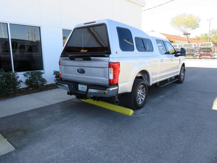 2020 Ford F250 with LEER 122, Blacked Out Nerf Bars, Tint, Hitch by TopperKING Brandon 813-689-2449 or Clearwater FL 727-530-9066. Call today!