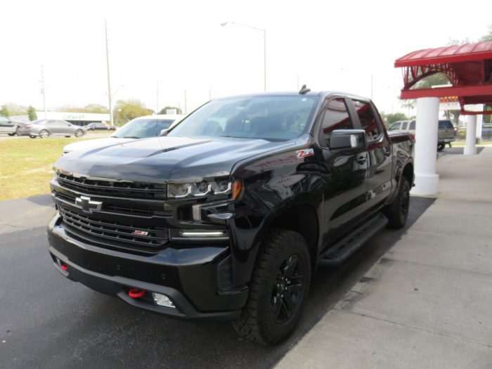 2020 Chevrolet Silverado with LEER 350M Side Steps, Hitch, Tint by TopperKING Brandon 813-689-2449 or Clearwater FL 727-530-9066. Call today!