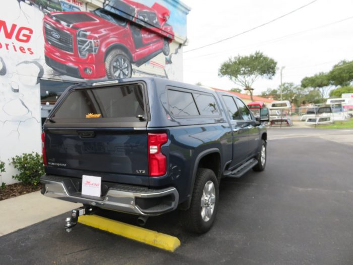 2020 Chevy Silverado with LEER 100R, Black out Nerf Bars, Hitch, Tint by TopperKING Brandon 813-689-2449 or Clearwater FL 727-530-9066. Call!