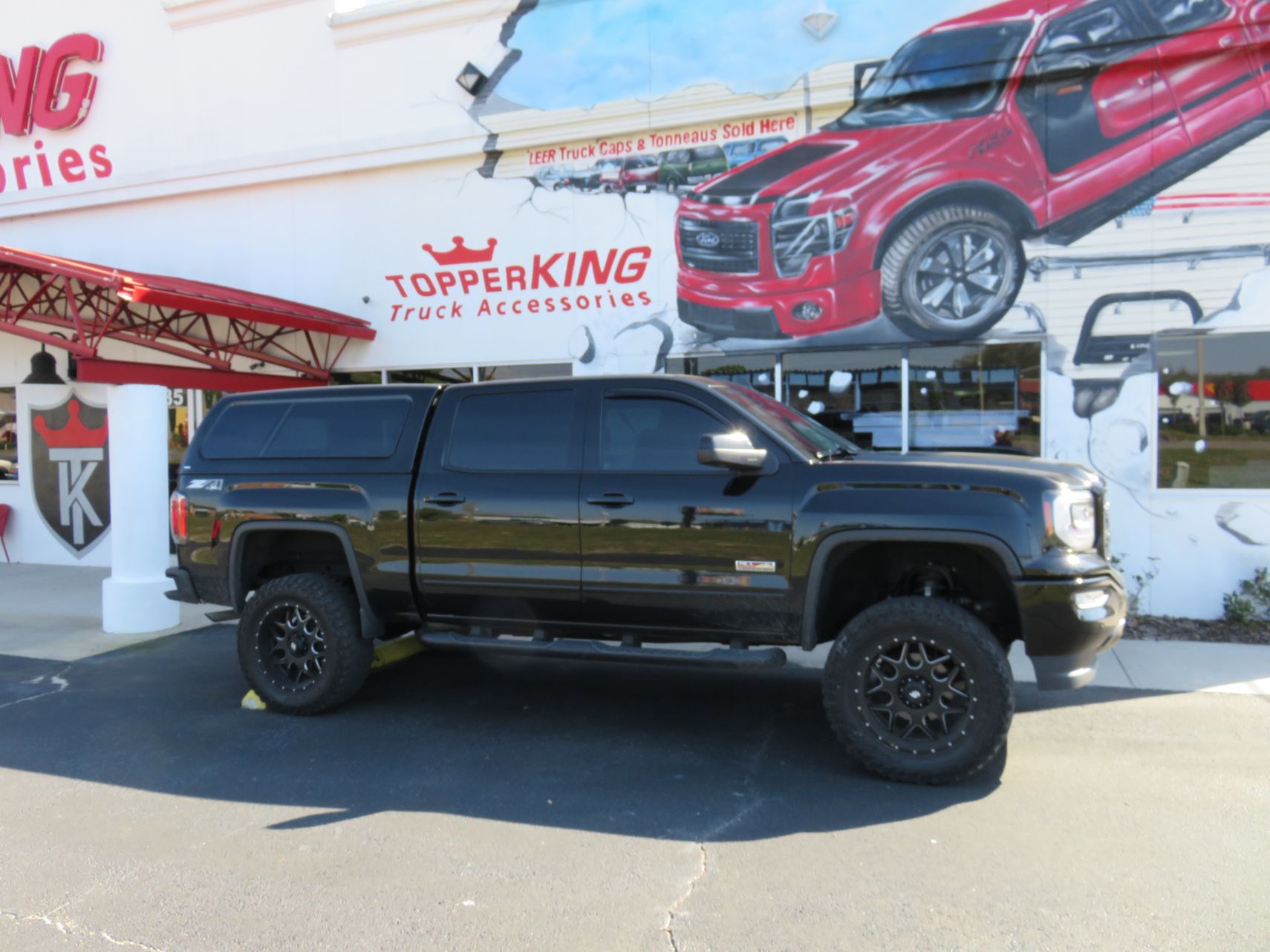 GMC Sierra Ranch Icon with Blacked Out Nerf Bars TopperKING
