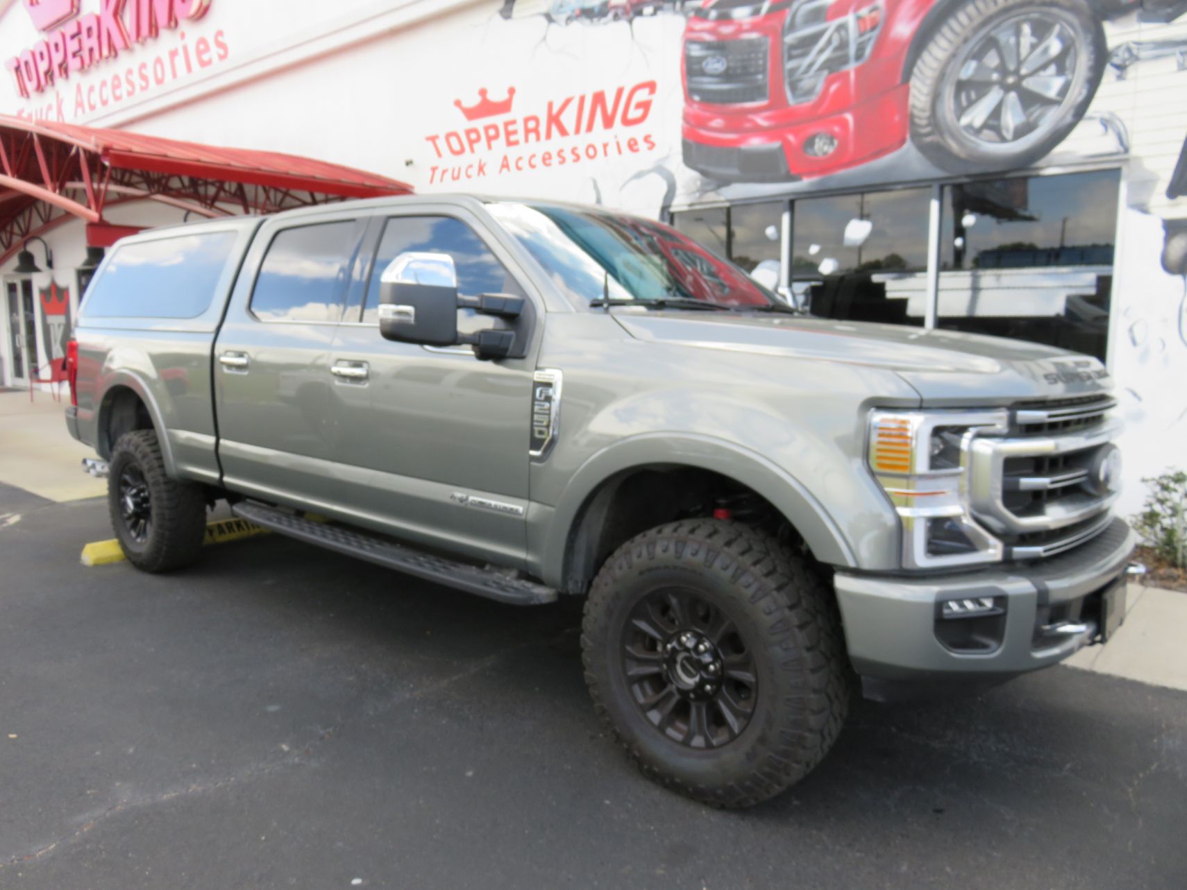 2021 Ford F250 with LEER 100XQ, Roof Racks, Side Steps, Tint, Hitch by TopperKING Brandon 813-689-2449 or Clearwater FL 727-530-9066. Call!