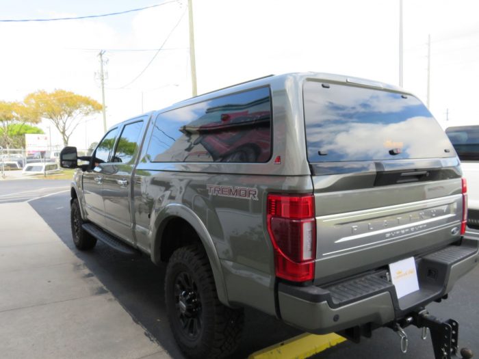 2021 Ford F250 with LEER 100XQ, Roof Racks, Side Steps, Tint, Hitch by TopperKING Brandon 813-689-2449 or Clearwater FL 727-530-9066. Call!