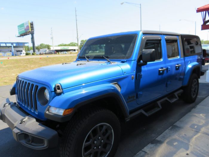 2020 Jeep Gladiator with LEER 100XQ, Vent Visors, Drop Down Steps, Hitch. Call TopperKING Brandon 813-689-2449 or Clearwater FL 727-530-9066.