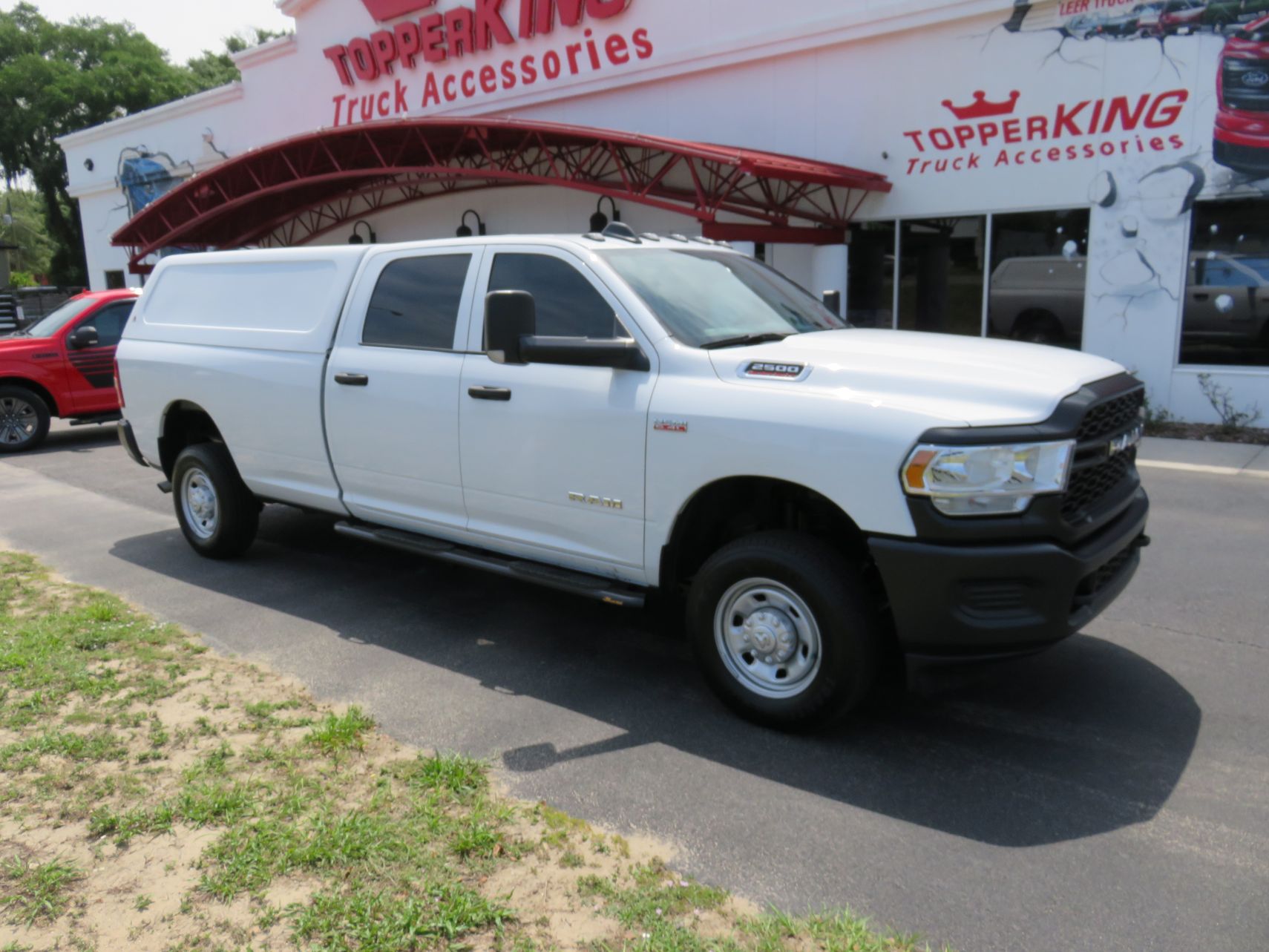 2021 Dodge RAM LEER 100R with Blacked Out Nerf Bars, Tint, Hitch by TopperKING Brandon 813-689-2449 or Clearwater FL 727-530-9066. Call today!