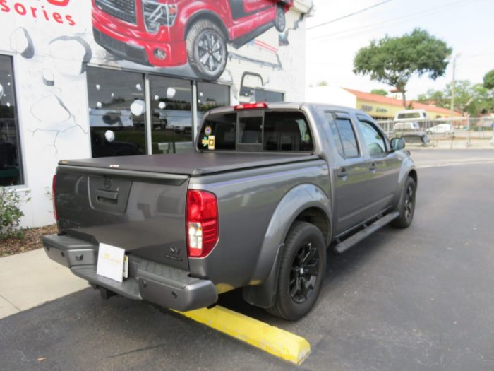 2020 Nissan Frontier with TruXport, Vent Visors, Nerf Bars, Hitch, Tint. Call TopperKING Brandon 813-689-2449 or Clearwater FL 727-530-9066.