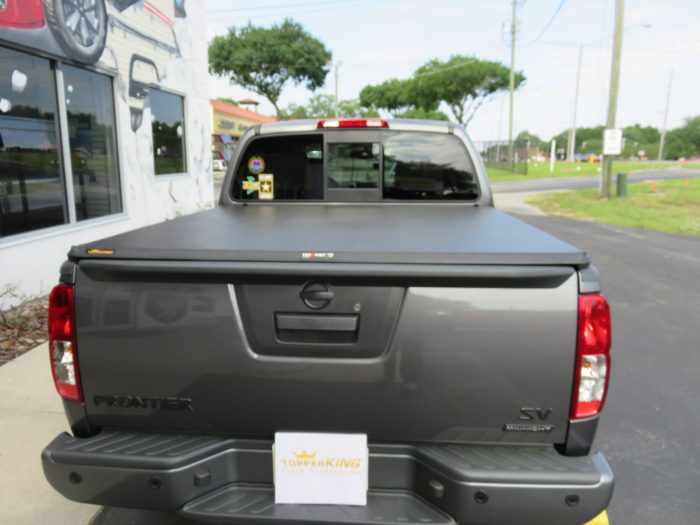 2020 Nissan Frontier with TruXport, Vent Visors, Nerf Bars, Hitch, Tint. Call TopperKING Brandon 813-689-2449 or Clearwater FL 727-530-9066.