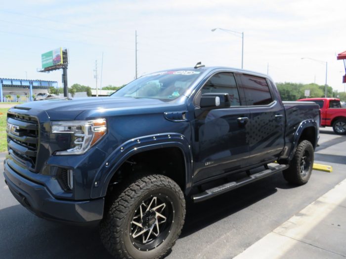2021 Sierra Mountain Top with Nerf Bars, Fender Flares, Hitch, Tint. Call TopperKING Brandon 813-689-2449 or Clearwater FL 727-530-9066 today!