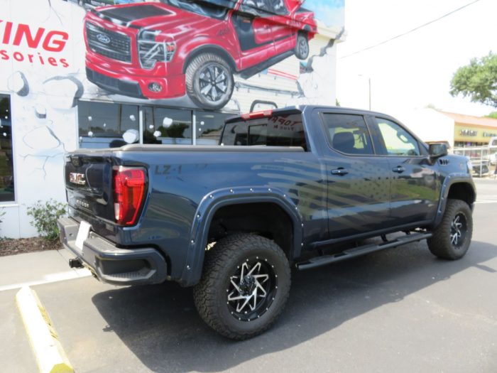 2021 Sierra Mountain Top with Nerf Bars, Fender Flares, Hitch, Tint. Call TopperKING Brandon 813-689-2449 or Clearwater FL 727-530-9066 today!