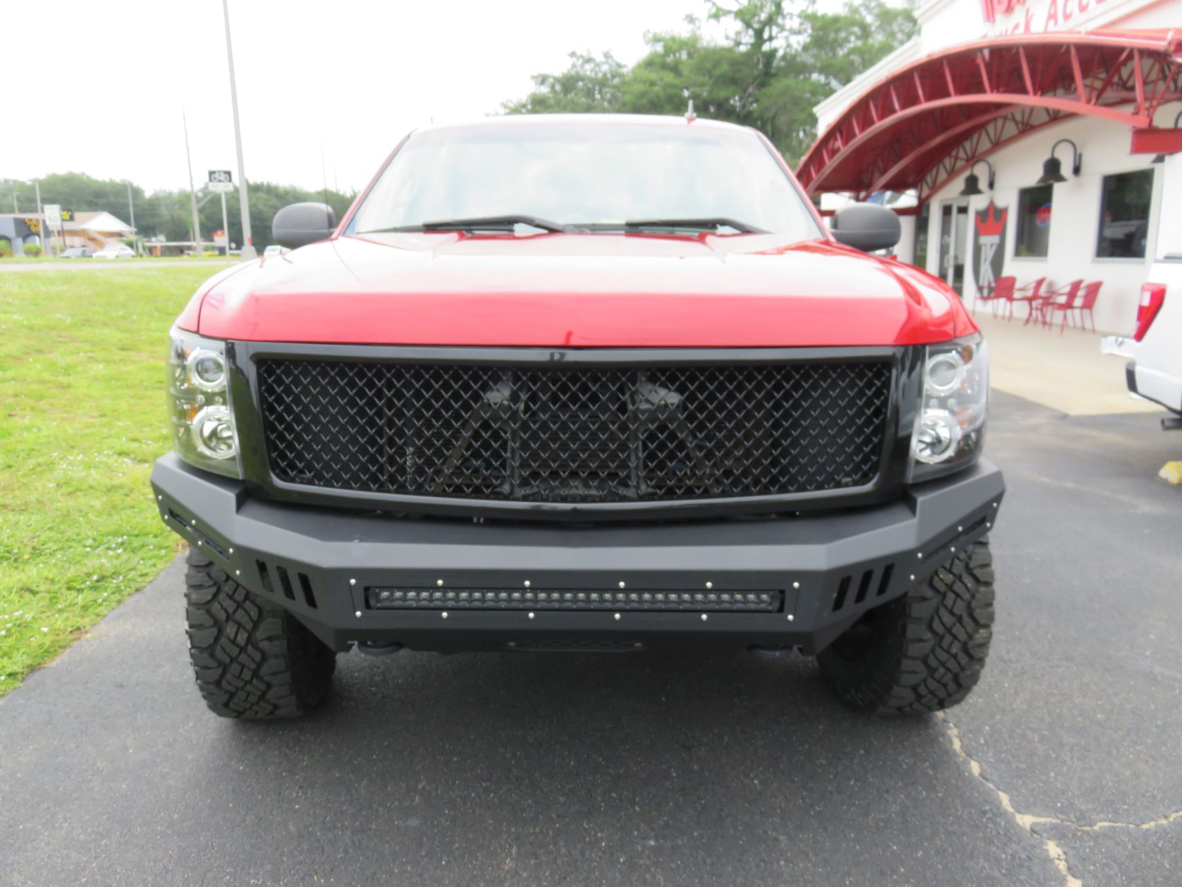 2007 red Chevy Silverado with Ranch Skyline TopperKING